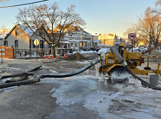 city street with water main break