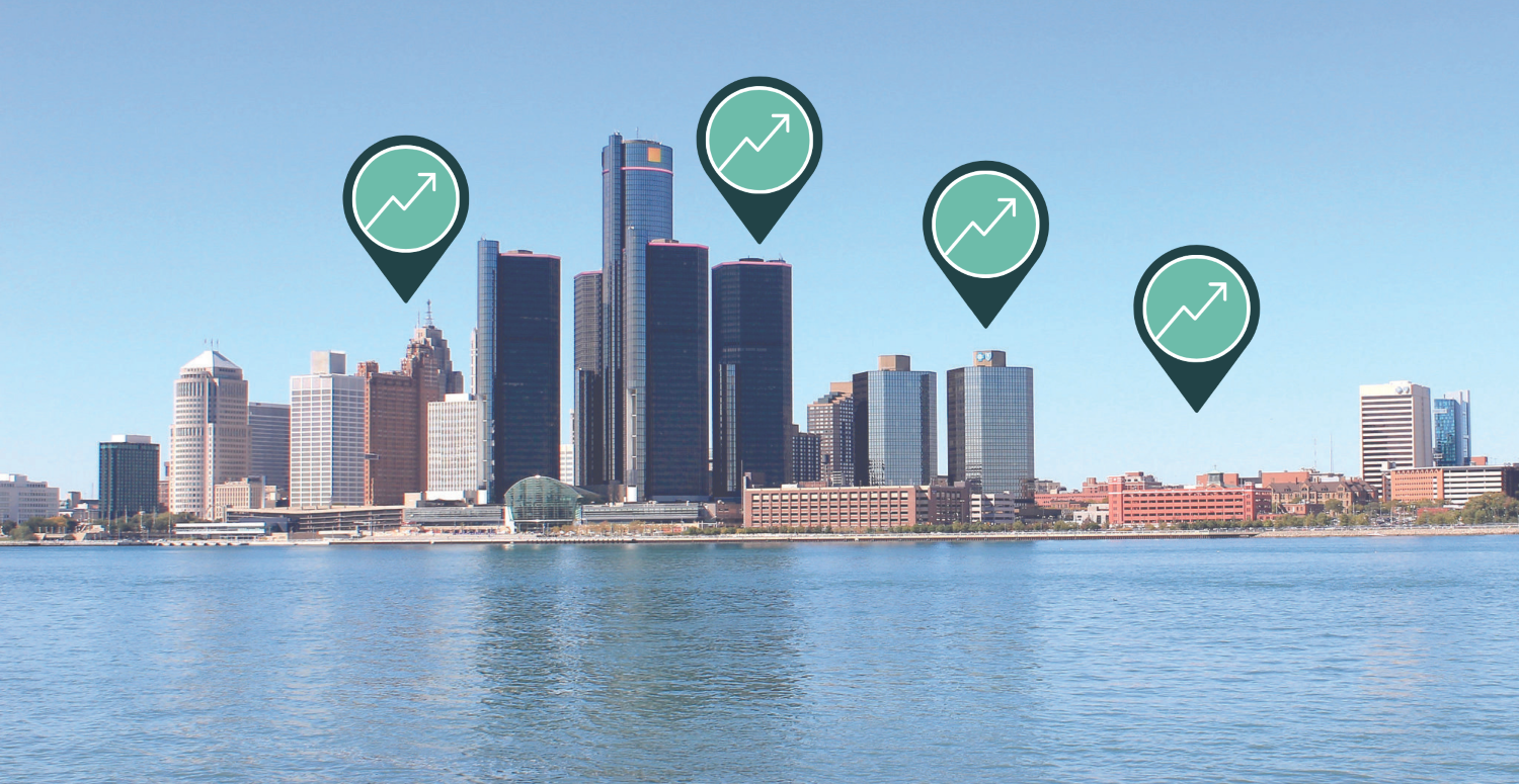 The Detroit Skyline with building Energy Charts above them.